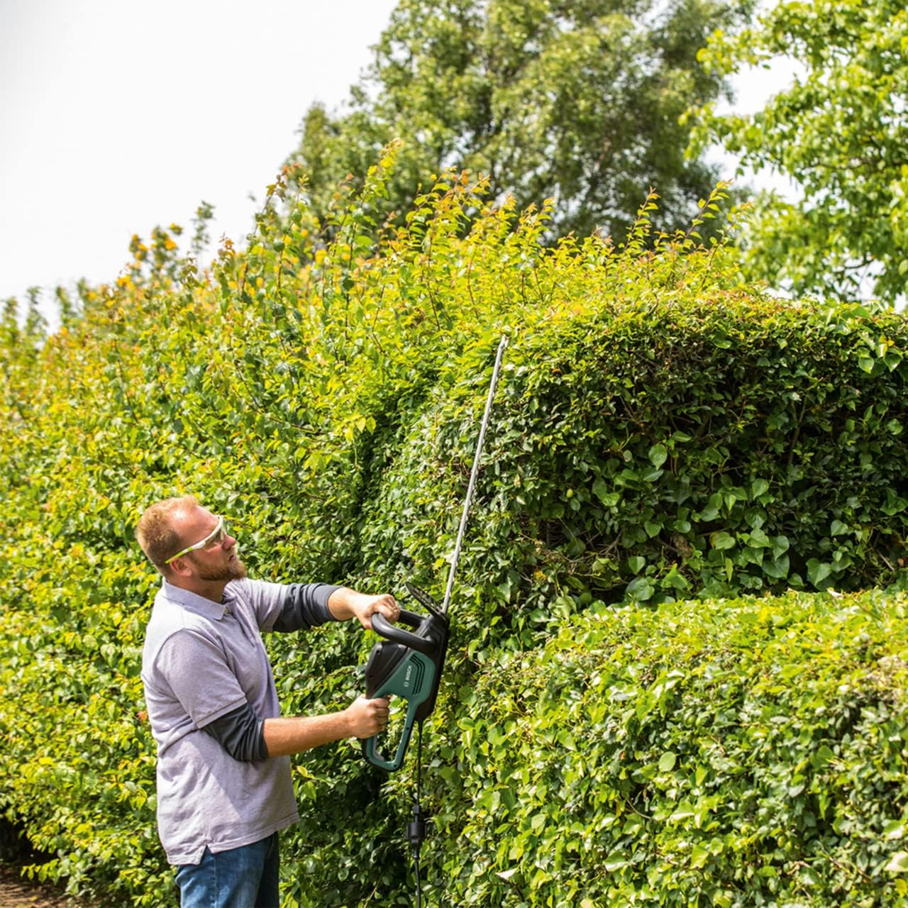 Bosch Heckenschere AdvancedHedgeCut 70 (500 Watt, Messerlänge: 70 cm, für große Hecken, Messerabstand: 34 mm, im Karton) — Bild 2